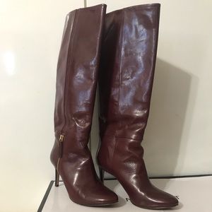 Knee high stiletto style heeled boots